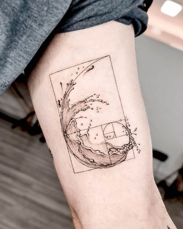 Minimalist wave and Fibonacci spiral tattoo on arm, showcasing intricate geometric design and artistry.