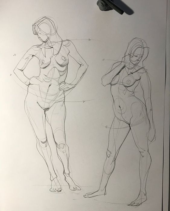 Pencil sketches of two standing female figures, focusing on anatomy and posture studies.