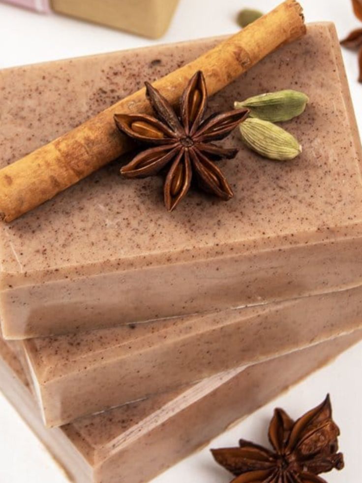 Handmade cinnamon spice soap bars with star anise and cardamom, perfect for natural skincare and aromatherapy.