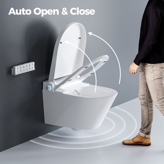 Smart toilet with automatic open and close lid feature activated by a person nearby.