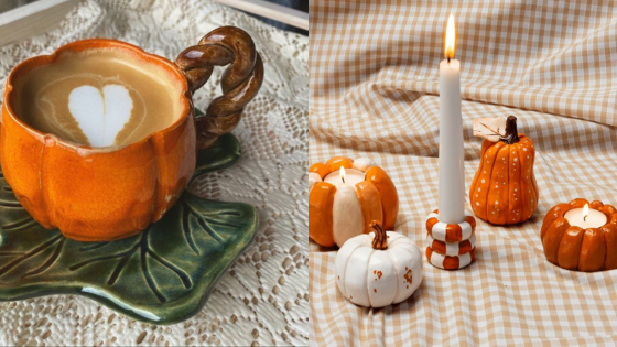 Pumpkin-themed latte and candle decor on checkered fabric, creating a cozy autumn ambiance.