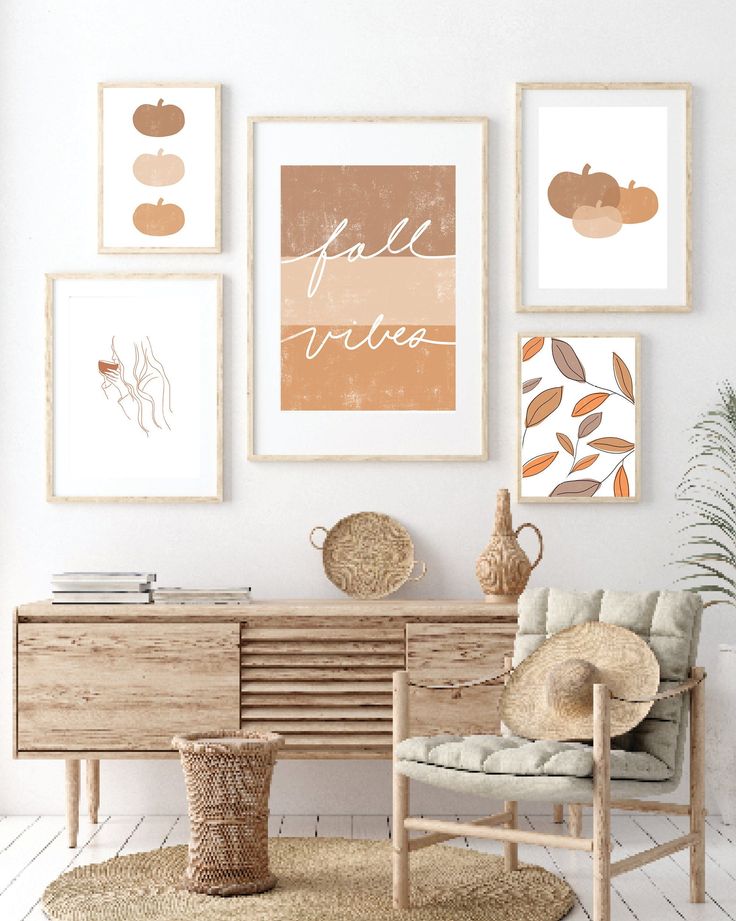 Cozy fall-themed art wall above a rustic wooden console with chair, basket, and decorative items.