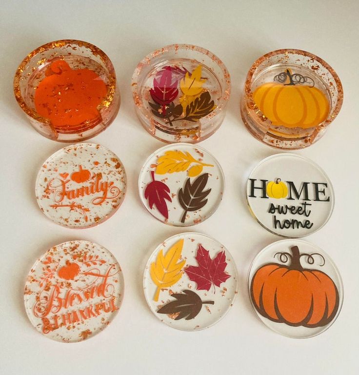 Fall-themed coasters with pumpkins, leaves, and Family, Home sweet home, and Blessed & Thankful messages.