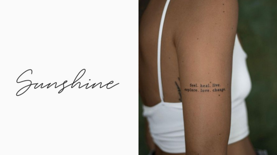 Scripted text Sunshine and inspirational tattoo on a woman's arm that reads feel. heal. live. explore. love. change.