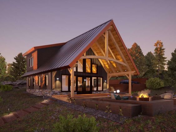 Modern A-frame cabin with large windows and outdoor seating area at dusk, surrounded by trees and soft lighting.