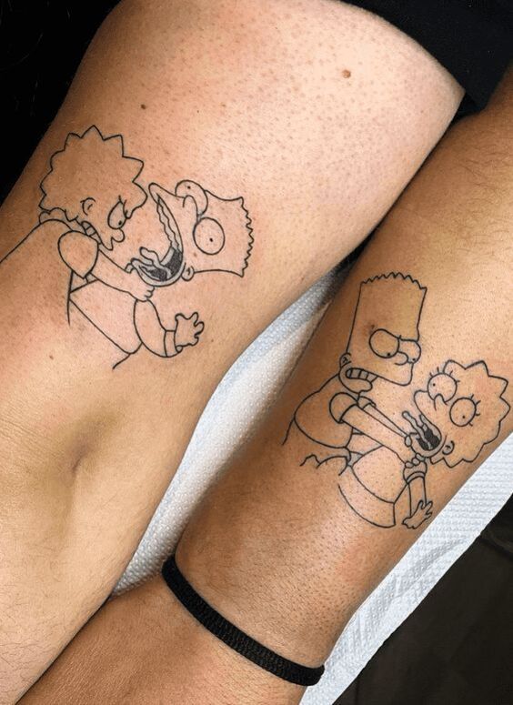 Unique cartoon sibling tattoos on arms, featuring playful fight scene outlines.