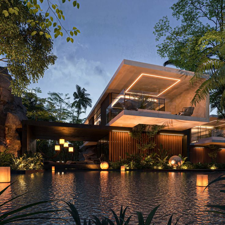 Modern luxury home with large windows, surrounded by tropical greenery and ambient evening lighting reflected on a serene pool.