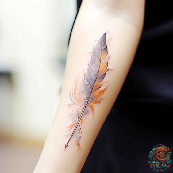 Feather tattoo on forearm with orange and black ink detailing, showcasing artistic flair and elegance.