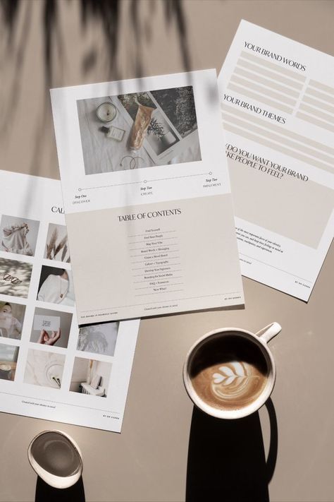 Brand guides and coffee on a table, featuring themes, words, and a photo layout for creative inspiration.