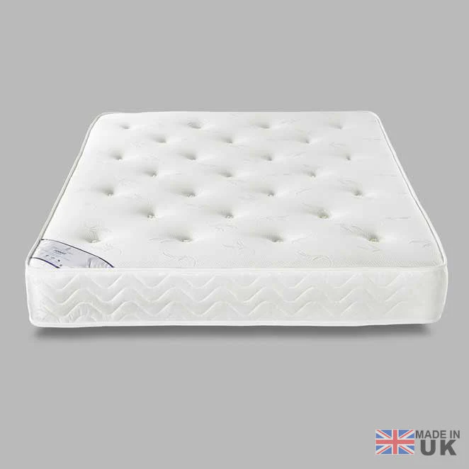 Comfortable white mattress made in the UK, featuring quilted design and plush support for restful sleep.