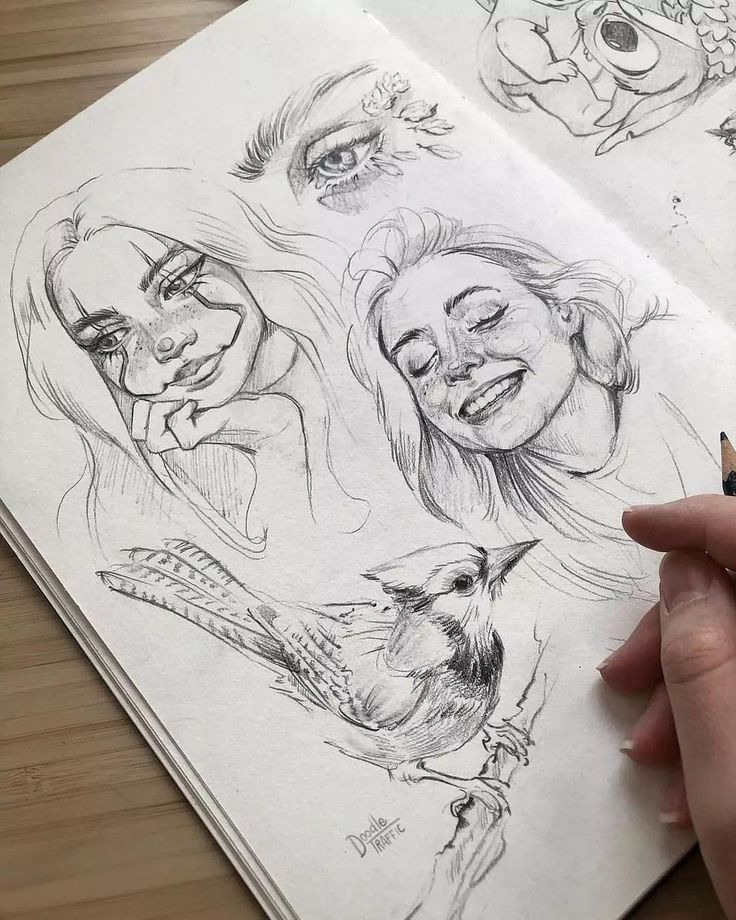 Sketchbook drawings featuring detailed portraits of women, close-up of an eye, and a bird, with an artist's hand.