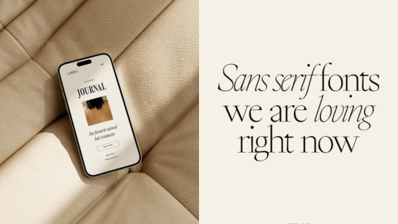 Phone on a beige textured surface displaying a journal next to text: Sans serif fonts we are loving right now.