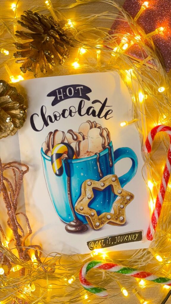 Festive hot chocolate illustration with blue mug, candy cane, star cookie, gold pinecones, and string lights.