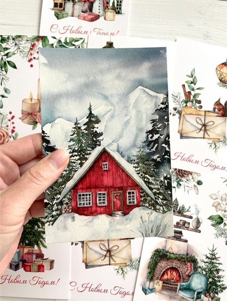 Festive holiday card featuring a snowy cabin and pine trees, surrounded by Christmas greetings and decorations.