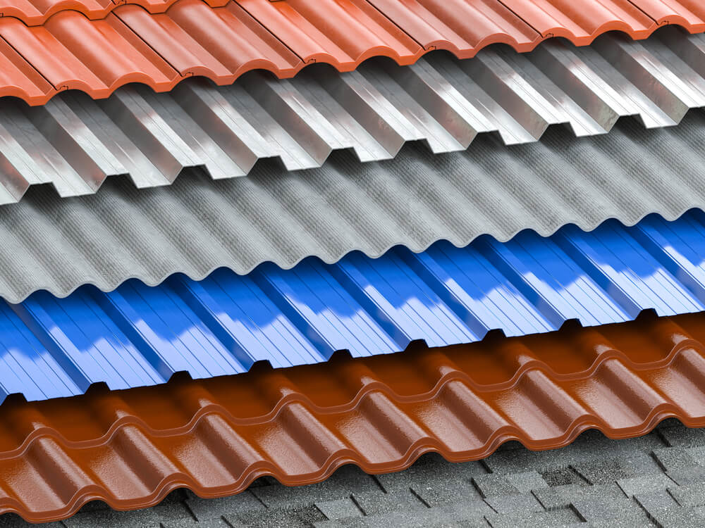 Stacked corrugated roofing sheets in various colors and materials for construction.