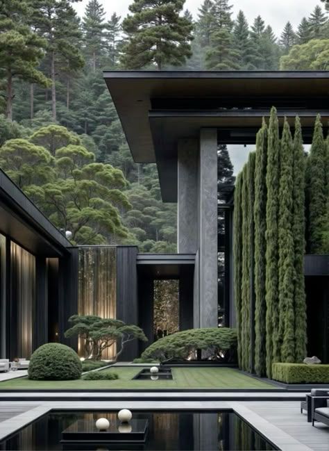 Modern minimalist house with lush garden, tall trees, and serene reflecting pool in a forest setting.