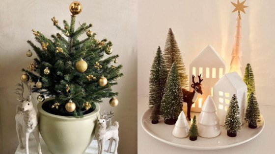 Mini Christmas tree with gold ornaments beside a festive holiday scene featuring reindeer and ceramic houses on a tray.