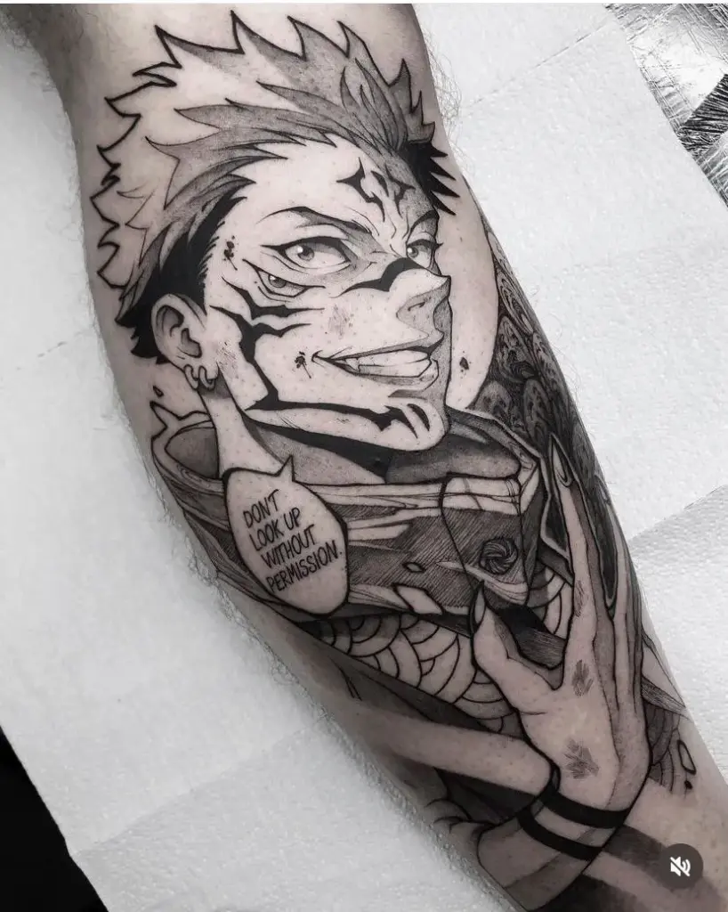 Sukuna from Jujutsu Kaisen1 Black-and-gray anime forearm tattoo of a grinning, marked male character with facial markings and speech bubble reading DON'T LOOK UP WITHOUT PERMISSION. | Sky Rye Design Black-and-gray anime forearm tattoo of a grinning, marked male character with facial markings and speech bubble reading DON'T LOOK UP WITHOUT PERMISSION.