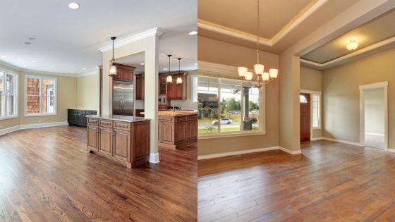 Spacious open-concept kitchen and dining room with hardwood floors and modern lighting.