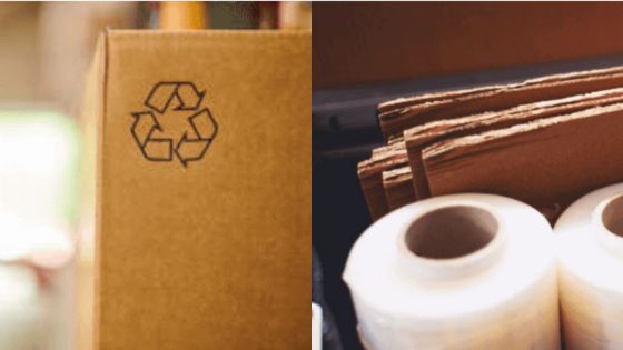 Recycling symbol on cardboard box beside packing materials and bubble wrap, promoting sustainable packaging practices.