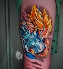 images 2 Vibrant Super Saiyan Goku Dragon Ball Z tattoo with golden hair and blue energy effects on upper arm, detailed colorful anime art. | Sky Rye Design Vibrant Super Saiyan Goku Dragon Ball Z tattoo with golden hair and blue energy effects on upper arm, detailed colorful anime art.