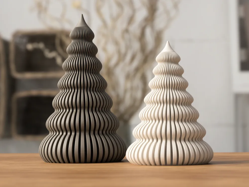 Modern decorative sculptures with intricate ridges on a table, featuring a minimalist black and white color scheme.