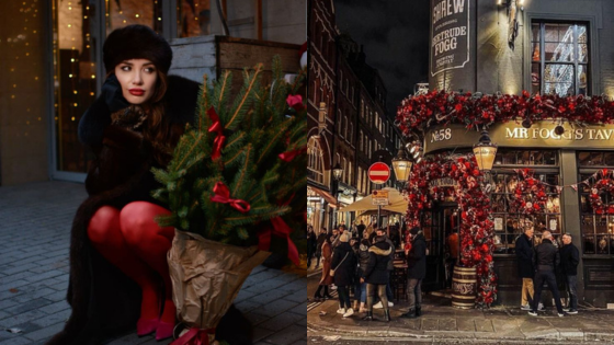 Woman in festive attire holding a holiday bouquet; a pub decorated with red flowers on a bustling evening street.