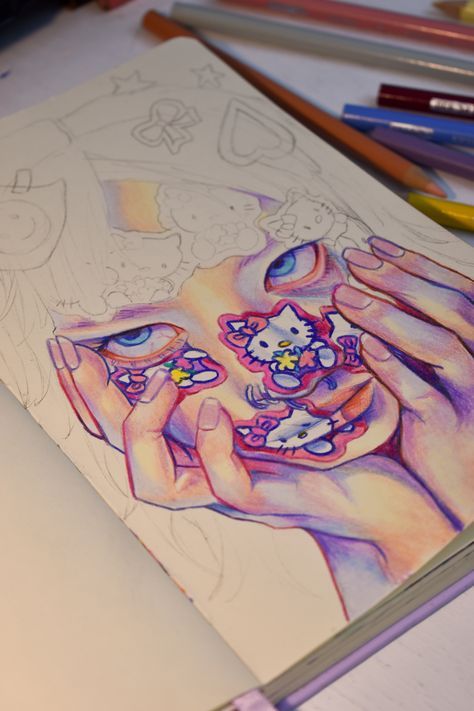 Colorful artistic drawing of a face with vibrant stickers and creative sketching details on paper.