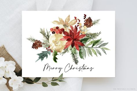 Festive Christmas card with floral arrangement and Merry Christmas text on white background.