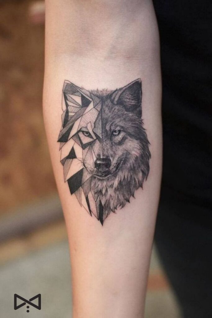 Geometric and realistic wolf tattoo on forearm, blending artistic styles in a striking design.