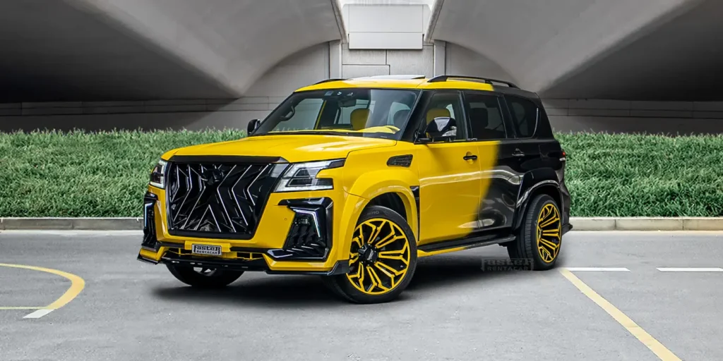 Yellow and black luxury SUV parked under a modern bridge, designed for a sporty and stylish urban look.