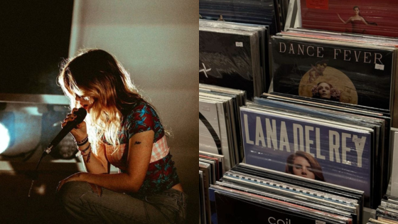 Singer performing live next to music records display, featuring Lana Del Rey and Dance Fever albums.