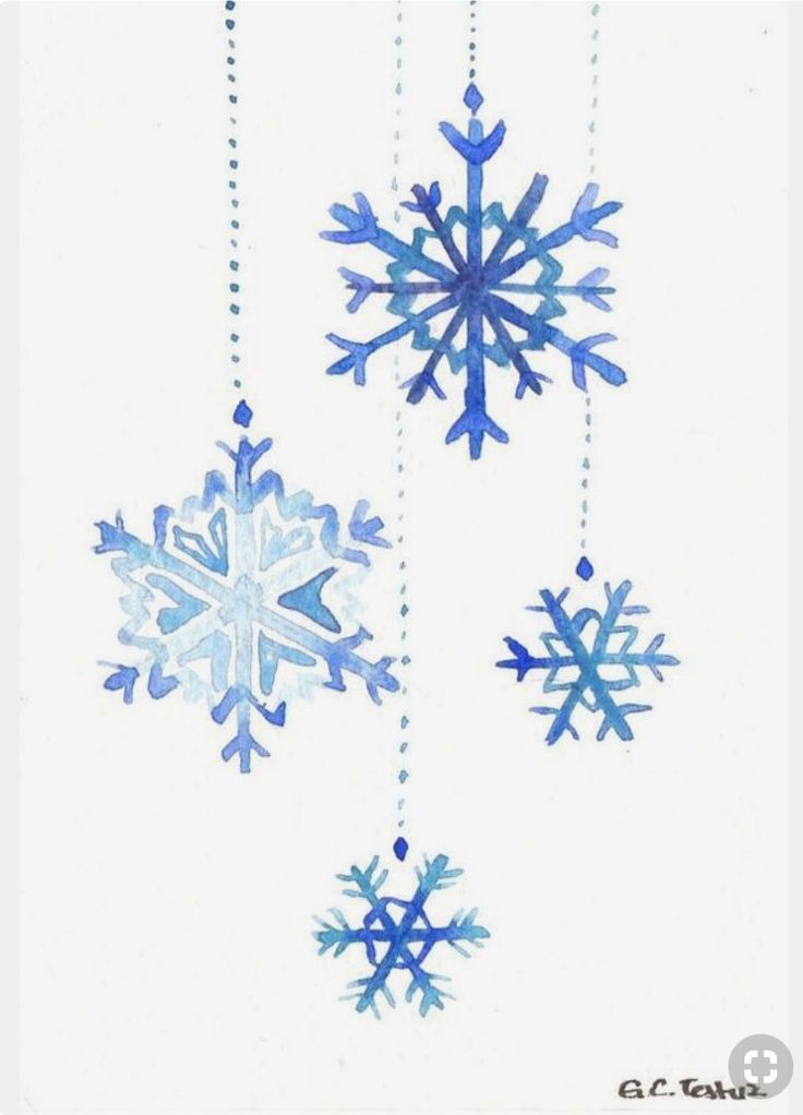 Blue watercolor snowflakes hanging in a winter-themed design on a white background.