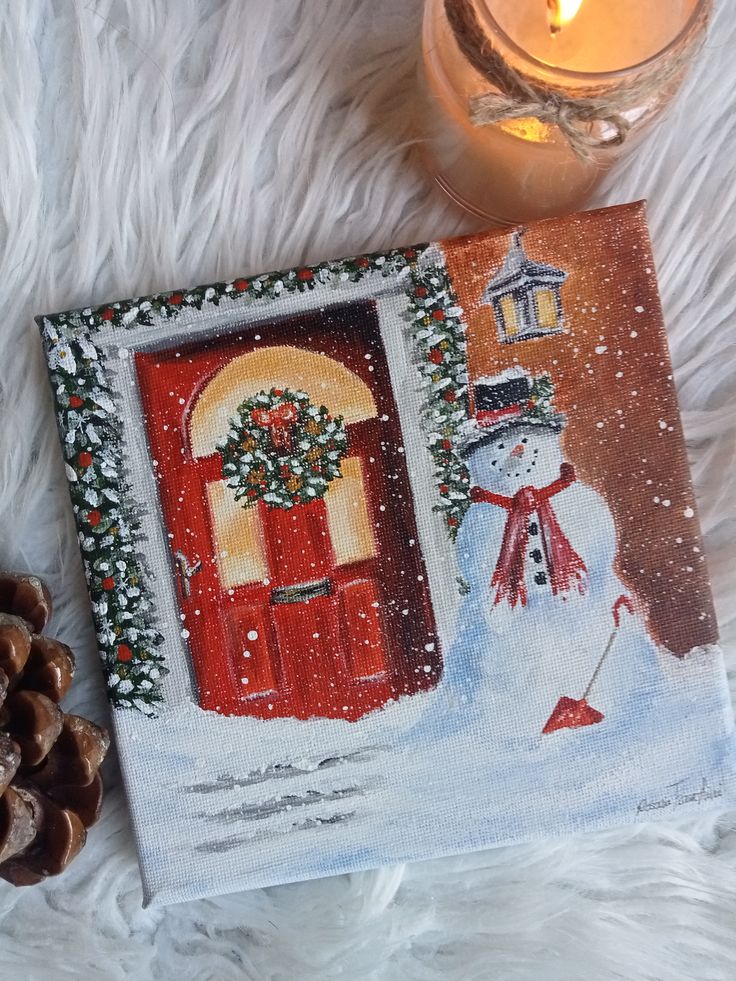 Festive holiday painting with a red door, wreath, snowman, and candlelight on a cozy fur background.