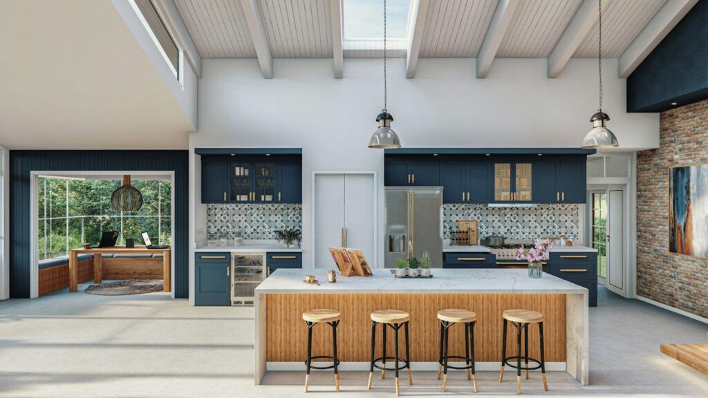 Modern kitchen with blue cabinets, island, bar stools, open layout, and large windows providing natural light.