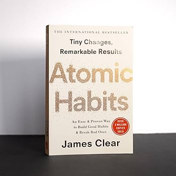 Cover of the book Atomic Habits by James Clear, focusing on habit formation and personal development strategies.