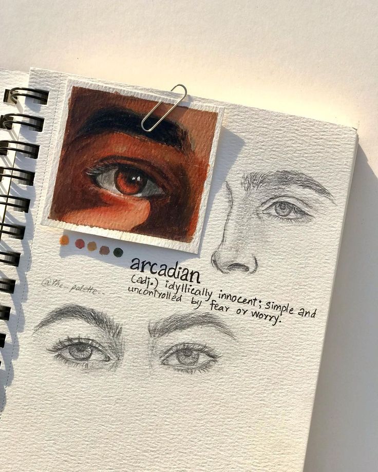 Sketchbook page with an eye painting, pencil sketches of eyes, and the definition of arcadian.