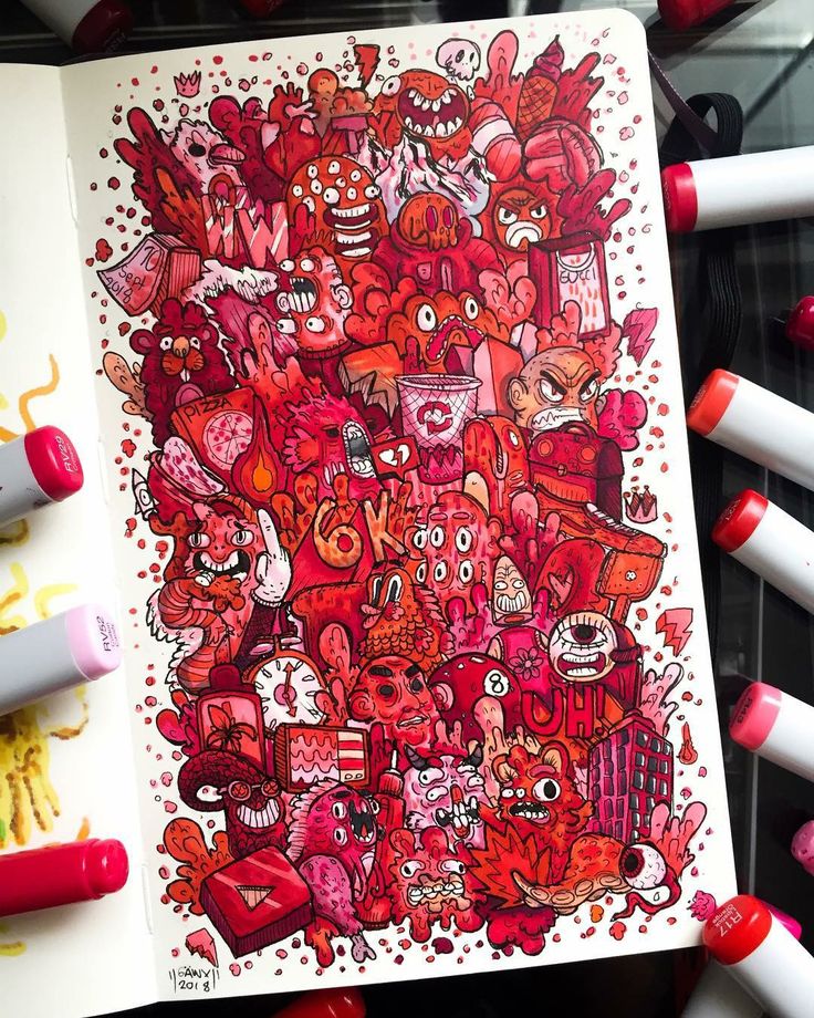 Colorful doodle art filled with expressive red and pink cartoon characters, markers visible around the sketchbook.