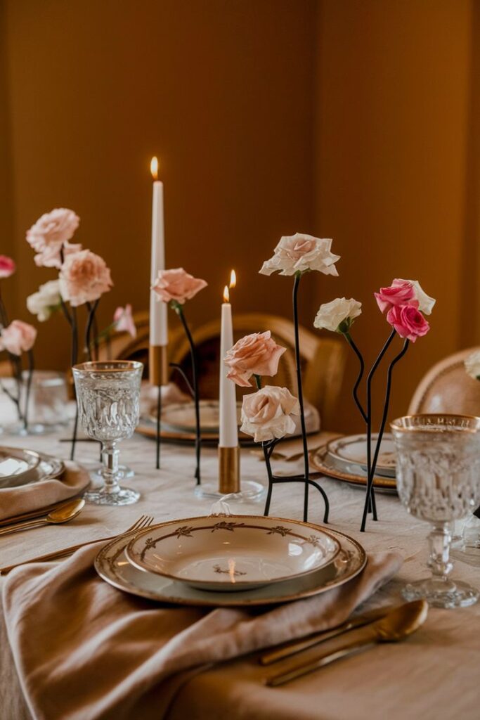 Elegant table setting with floral decorations, tall candles, and fine china, creating a romantic dining ambiance.