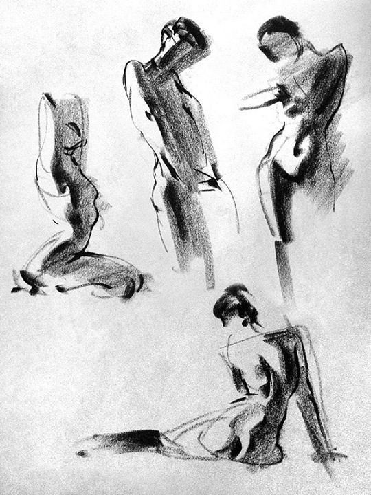 Charcoal figure sketches showcasing dynamic human poses on paper.