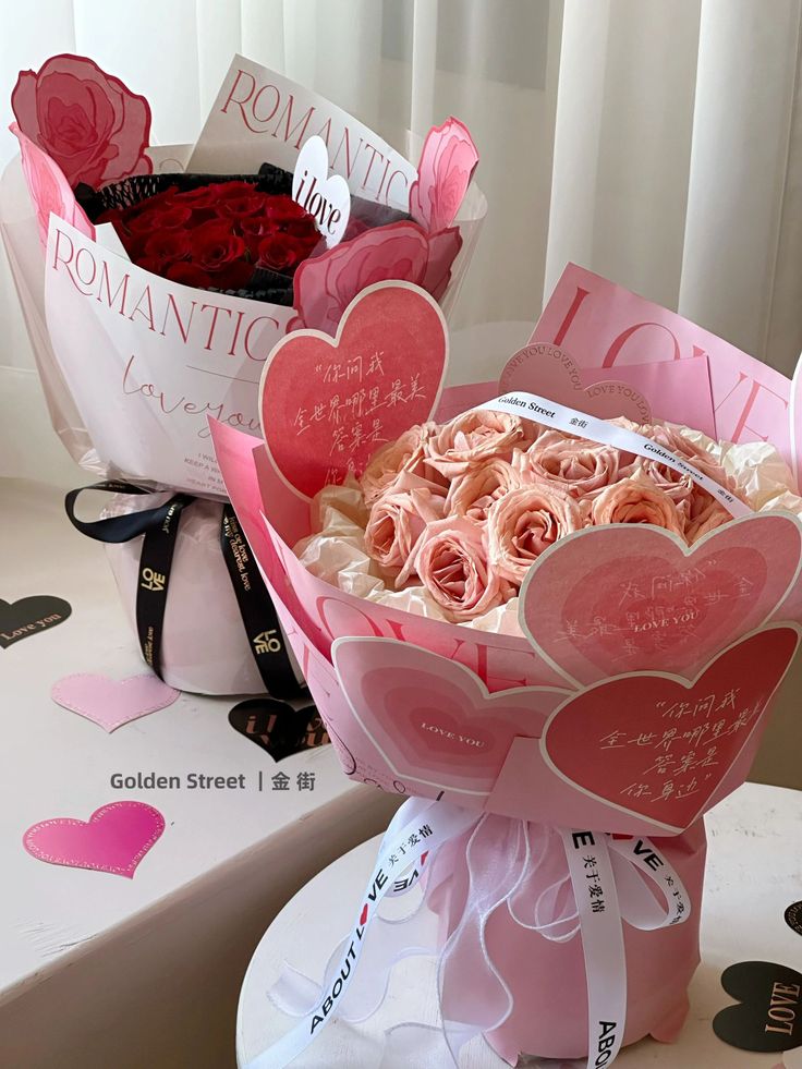 Elegant pink and red rose bouquets with romantic heart decorations, perfect for expressing love and affection.