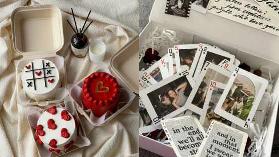 Decorative cakes with hearts and gift box filled with playing cards and photos, perfect for a romantic occasion.