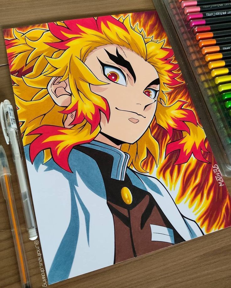 Anime character drawing with fiery hair and vibrant markers, showcasing artistic creativity on a wooden surface.