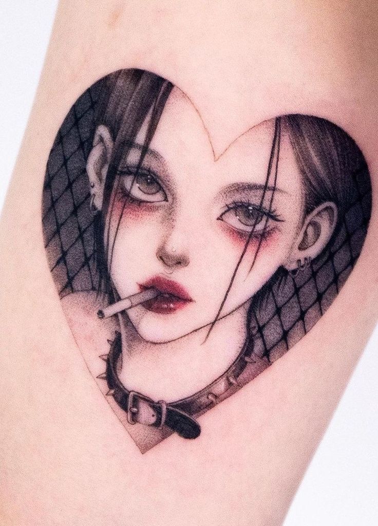 Heart-shaped tattoo of a woman with smoky eyes and a cigarette, featuring a black net background and choker detail.