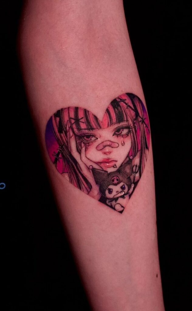 Heart-shaped tattoo with an anime-inspired girl and cute character on an arm, featuring pink and black hues.