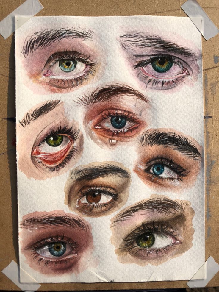 Watercolor painting of various expressive eyes on textured paper.