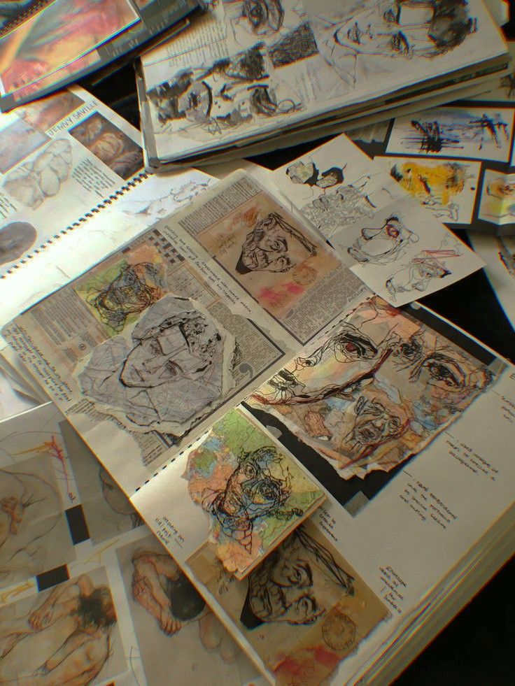 Art sketches and collages on overlapping papers, showcasing expressive drawings and creative illustrations.