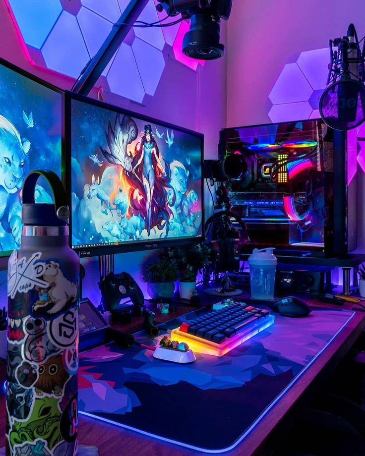 Vibrant gaming setup with dual monitors, RGB keyboard, and custom PC case, bathed in colorful LED lights.