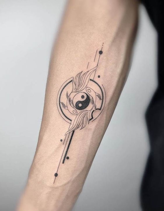 Intricate yin-yang tattoo on forearm with abstract lines and feathers, symbolizing balance and harmony.