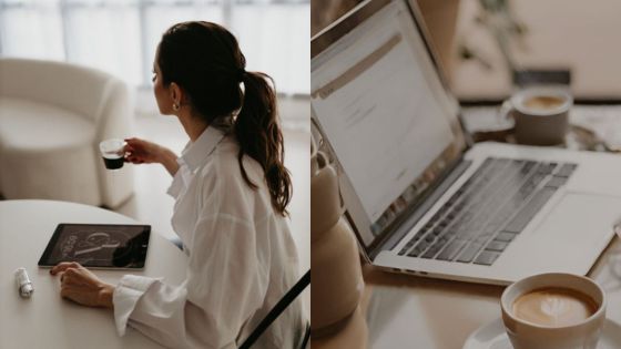 Woman drinking coffee while working on laptop at table, featuring tablet and coffee cups. Cozy workspace environment.